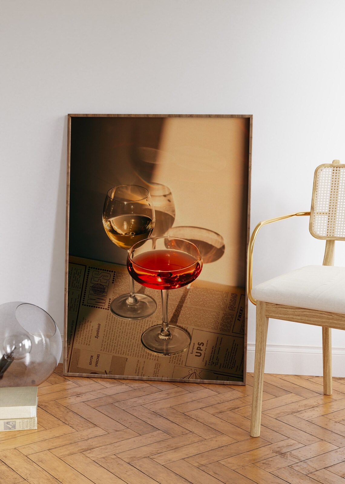 Golden Hour Wine Glasses Poster Layered Over Retro Newspaper Backdrop