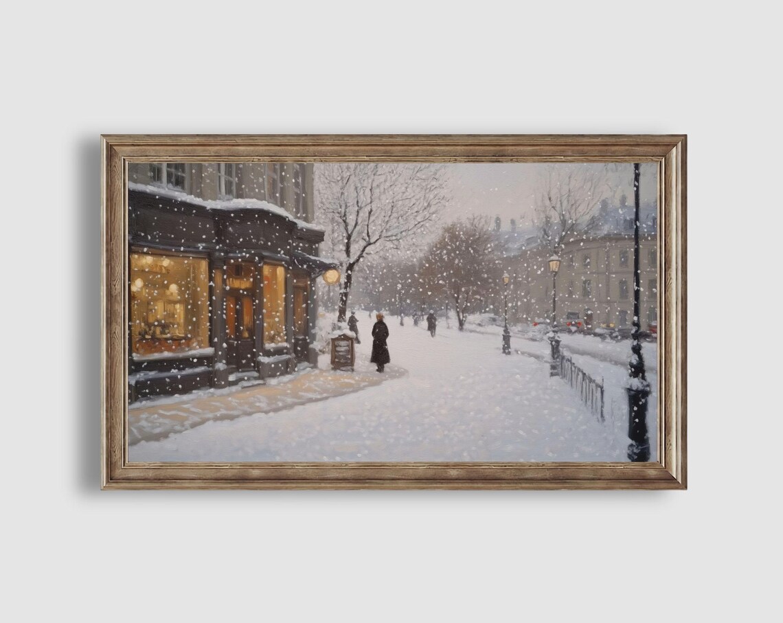 Snowy Winter City Street with Glowing Shop Windows and Falling Snow Poster - Image 2