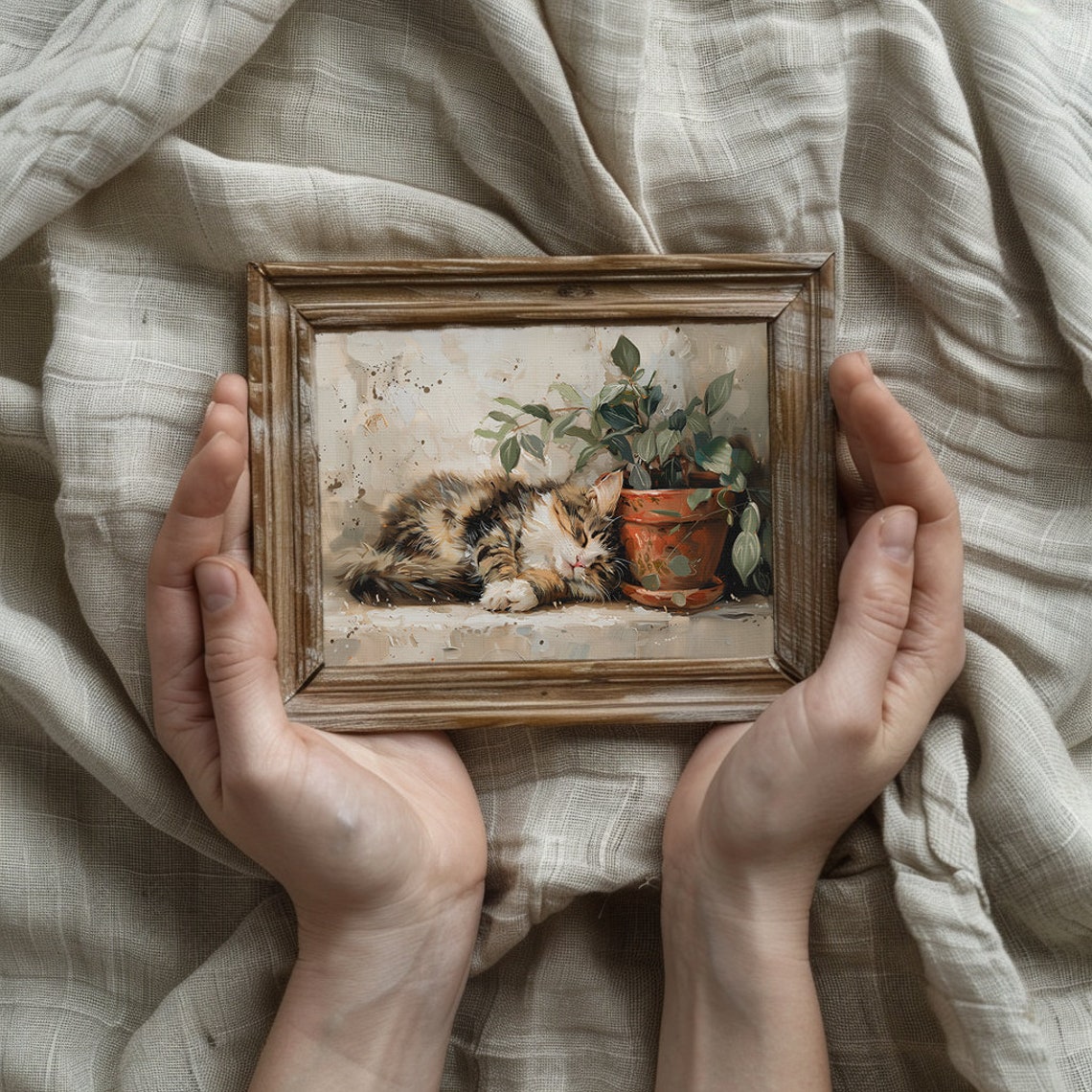 Fluffy Tabby Cat Sleeping by a Terracotta Potted Plant Poster - Image 3