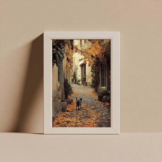 Black Cat Strolling Down a Cobblestone Autumn Alleyway Poster