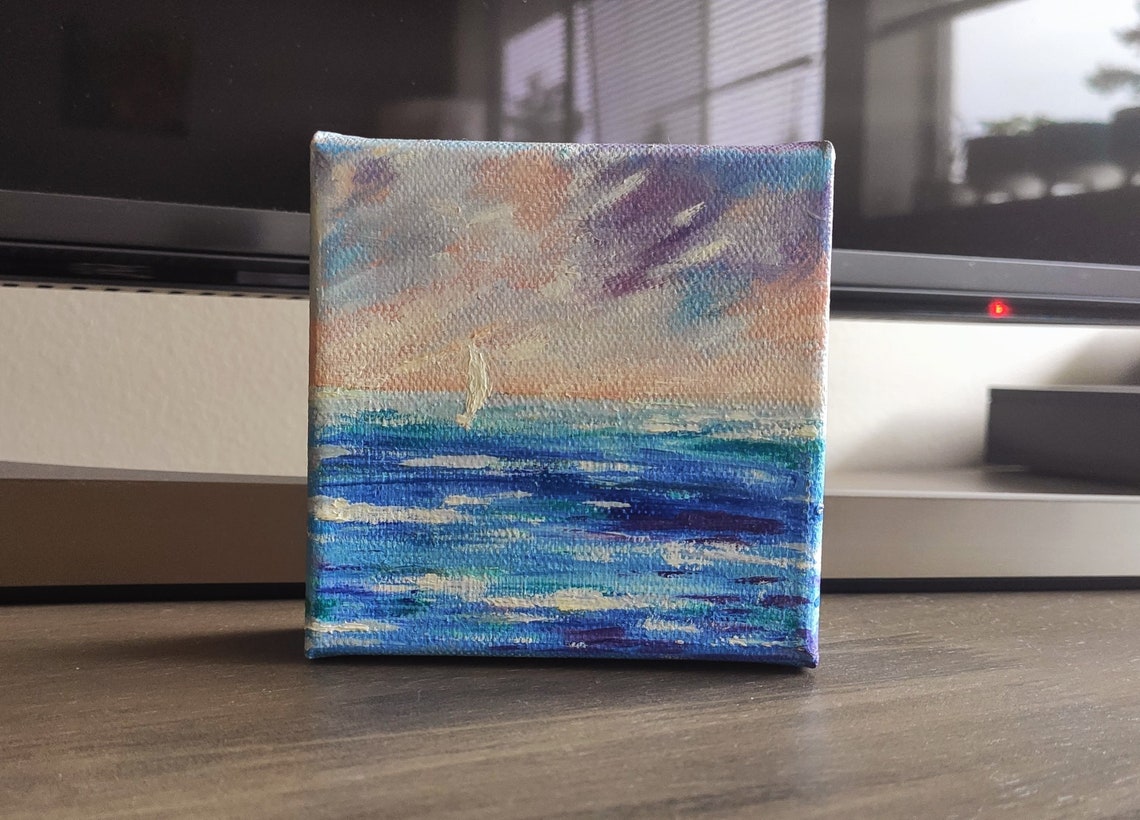 Tiny Sailboat Under Lavender Pink Dawn Sky On Blue Waves Art Poster - Image 2