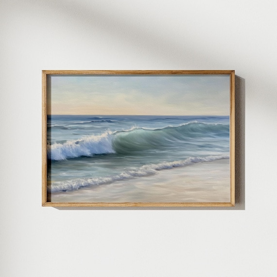 Rolling Ocean Waves at Sunrise Over a Quiet Sandy Beach Poster