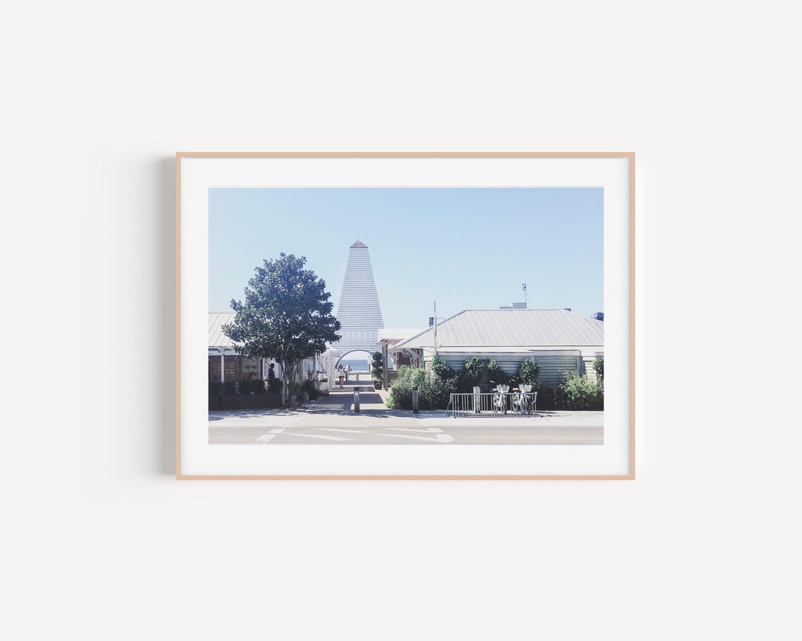 Seaside Pavilion Poster of a Coastal Walkway and Landmark Spire View