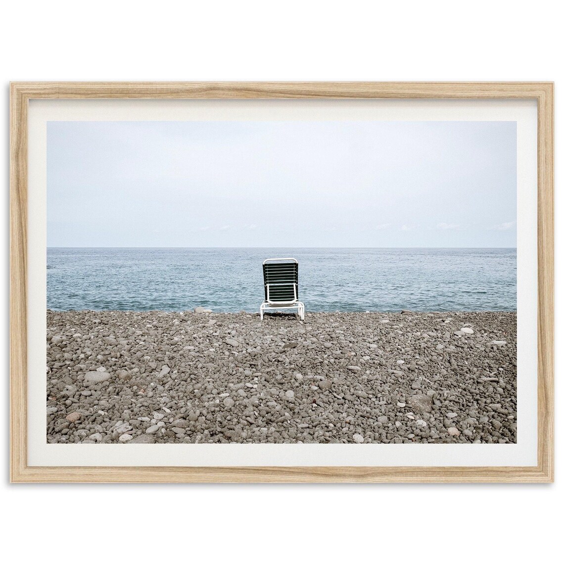 Minimalist Pebble Beach Chair Facing Calm Sea Photo Art Print