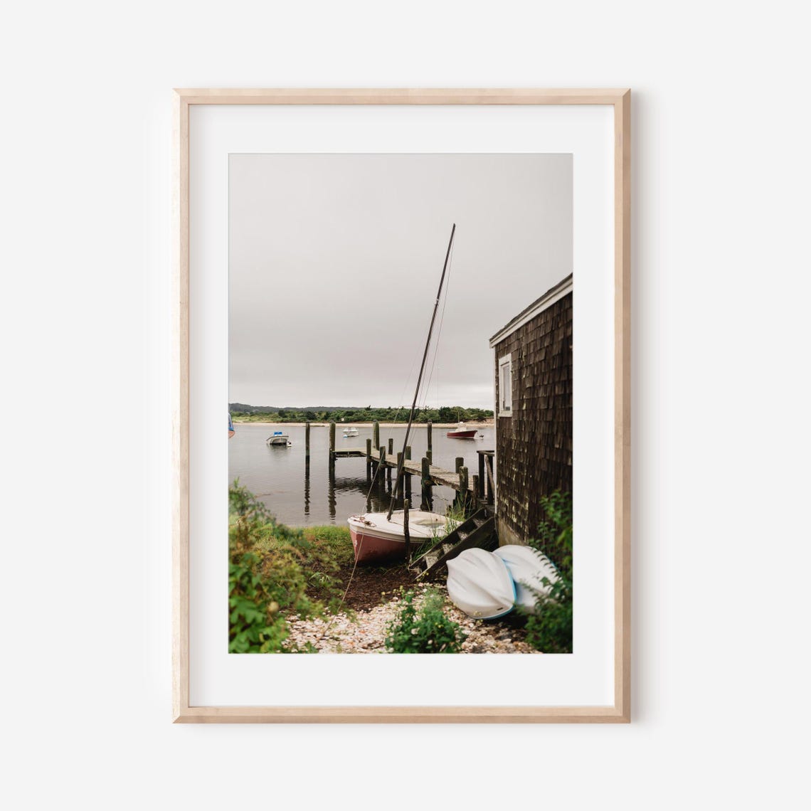 Sailboats Resting Beside a Weathered Boathouse Dock Scene Poster