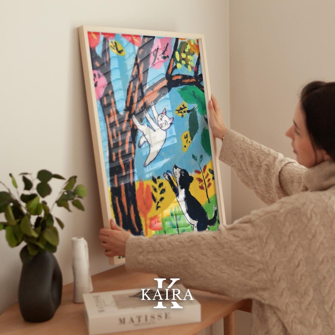 White Cat Climbing a Tree While a Puppy Watches Below Poster - Image 2