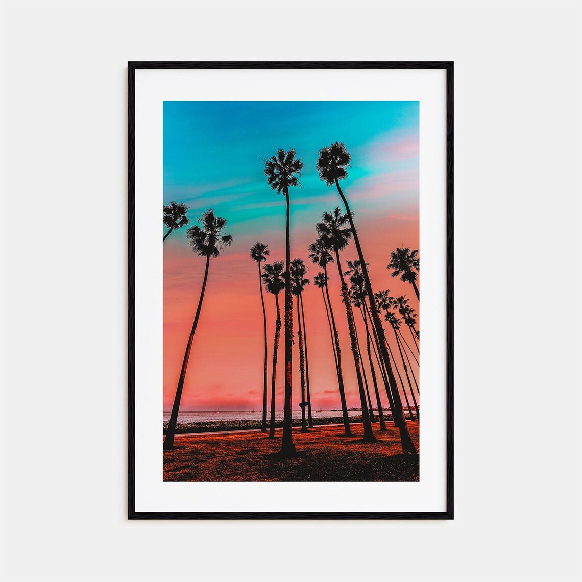 California Palm Trees Against a Teal and Coral Sunset Poster