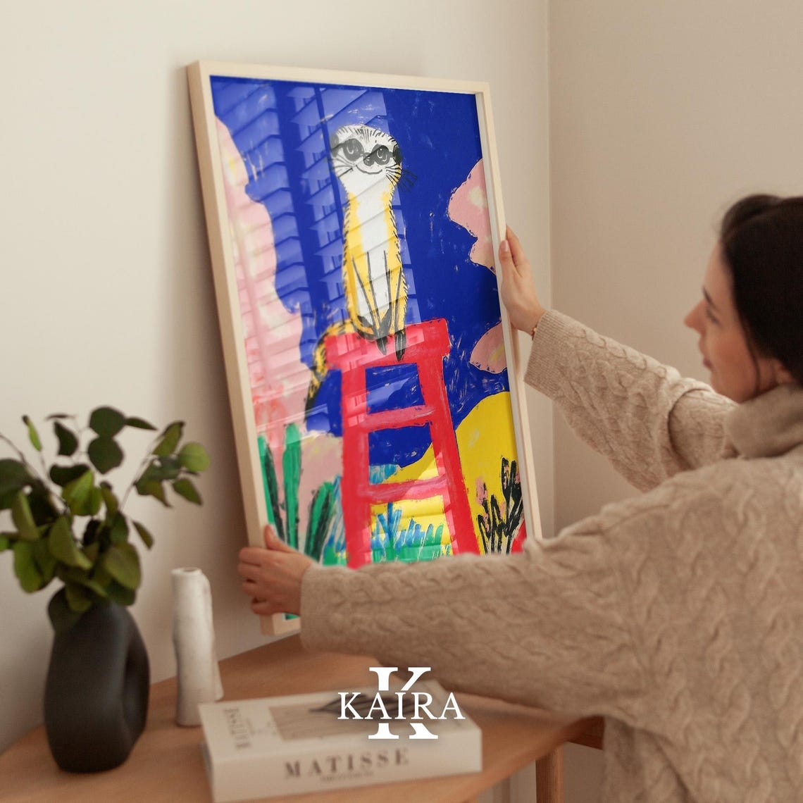 Curious Meerkat Standing Tall and Proud on a Bright Red Stool Poster - Image 2