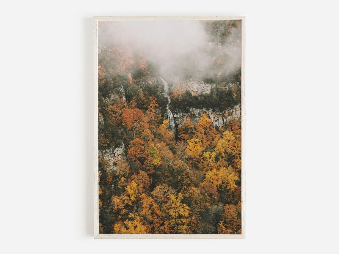Misty Waterfall Cascading Through a Fiery Autumn Forest Poster