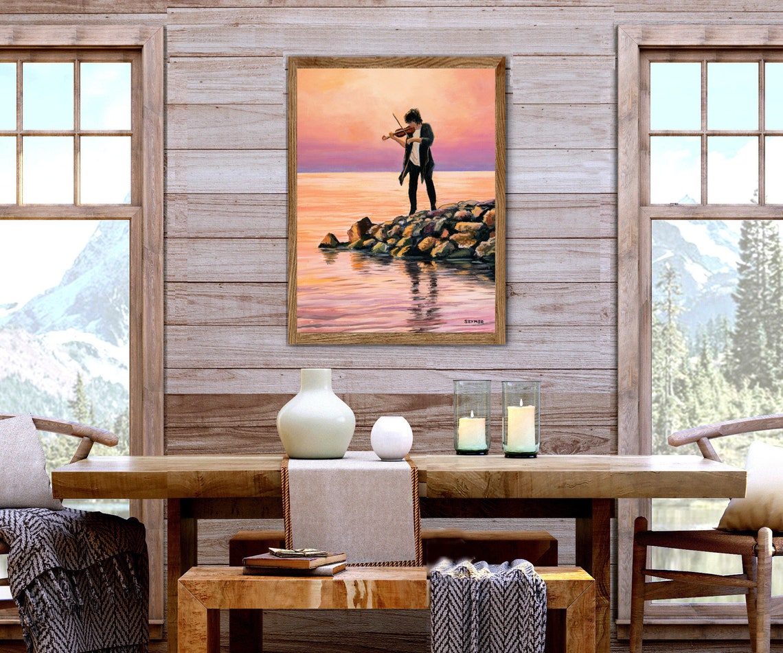 Violinist Playing on a Rocky Shore at Sunset over the Sea Poster - Image 2