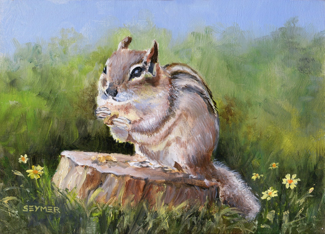 Cute Striped Chipmunk Sitting on a Tree Stump in a Sunny Meadow Poster - Image 6