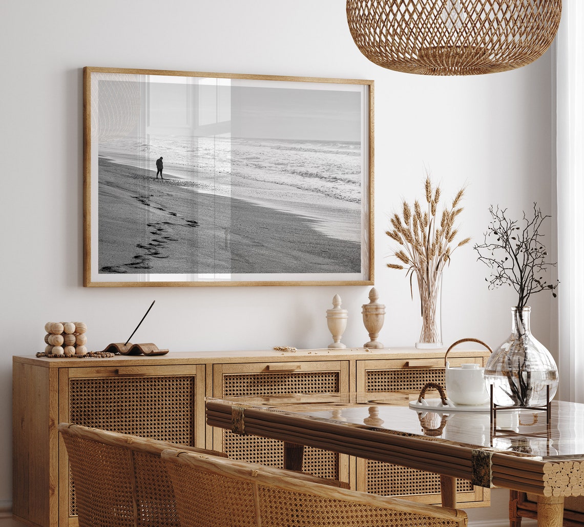 Lone Figure Walking Empty Beach Footprints Black And White Poster - Image 4