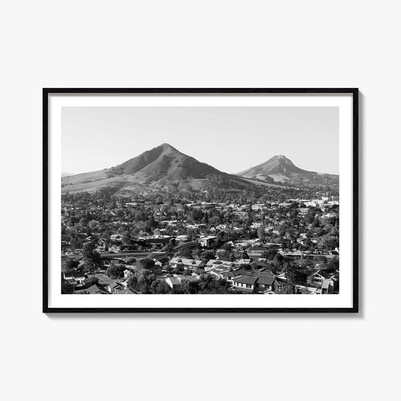 Black and White Small Town Beneath Twin Volcanic Peaks Photo Poster