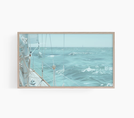 View from a Sailboat Bow Over the Sparkling Turquoise Ocean Poster