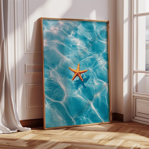 Orange Starfish Floating In Sparkling Turquoise Ocean Water Wall Art