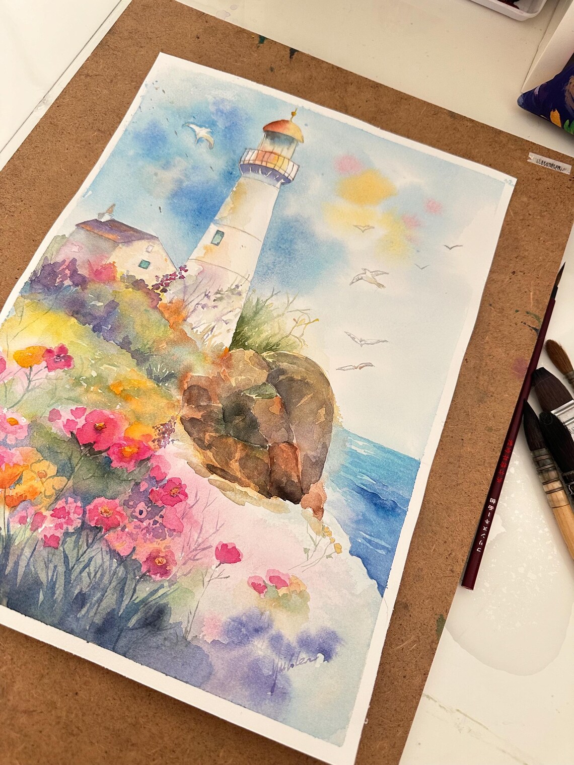 White Lighthouse on a Rocky Wildflower Coast Watercolor Poster - Image 4