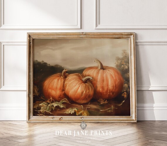 Three Ripe Orange Pumpkins With Autumn Leaves In Soft Light Poster