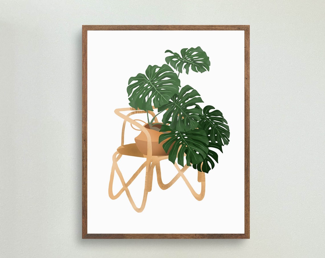 Monstera Deliciosa in a Terracotta Pot on a Rattan Plant Stand Poster - Image 2