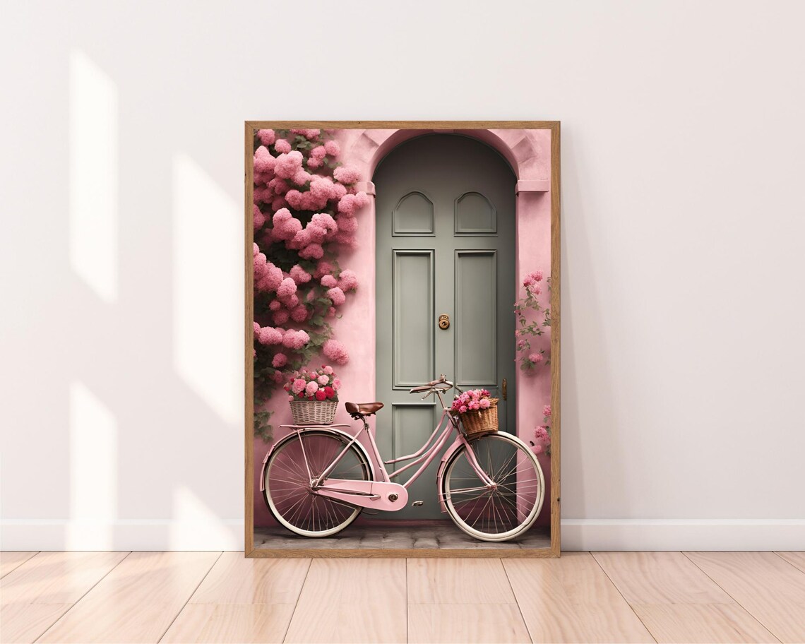 Pink Bicycle with Flower Baskets by a Green Door Charming Poster - Image 2
