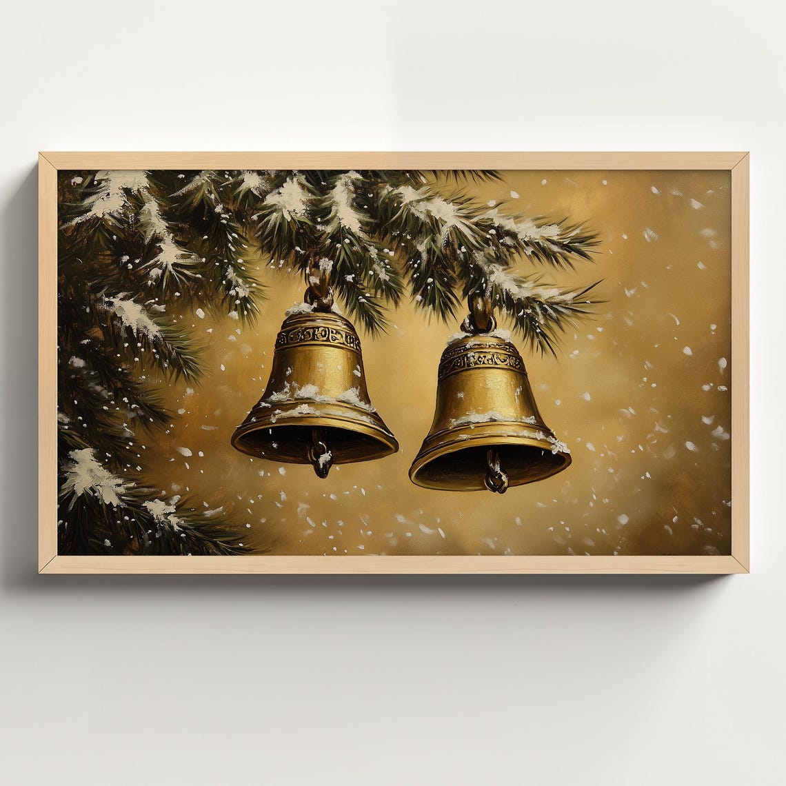 Two Gold Christmas Bells Hanging from a Snowy Pine Branch Poster