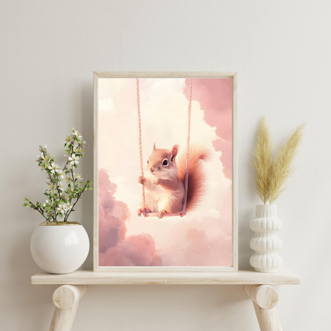 Cute Fluffy Squirrel Sitting on a Rope Swing Floating in Pink Clouds Poster - Image 3