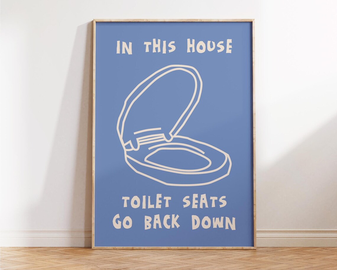 In This House Toilet Seats Go Back Down Funny Blue Bathroom Poster