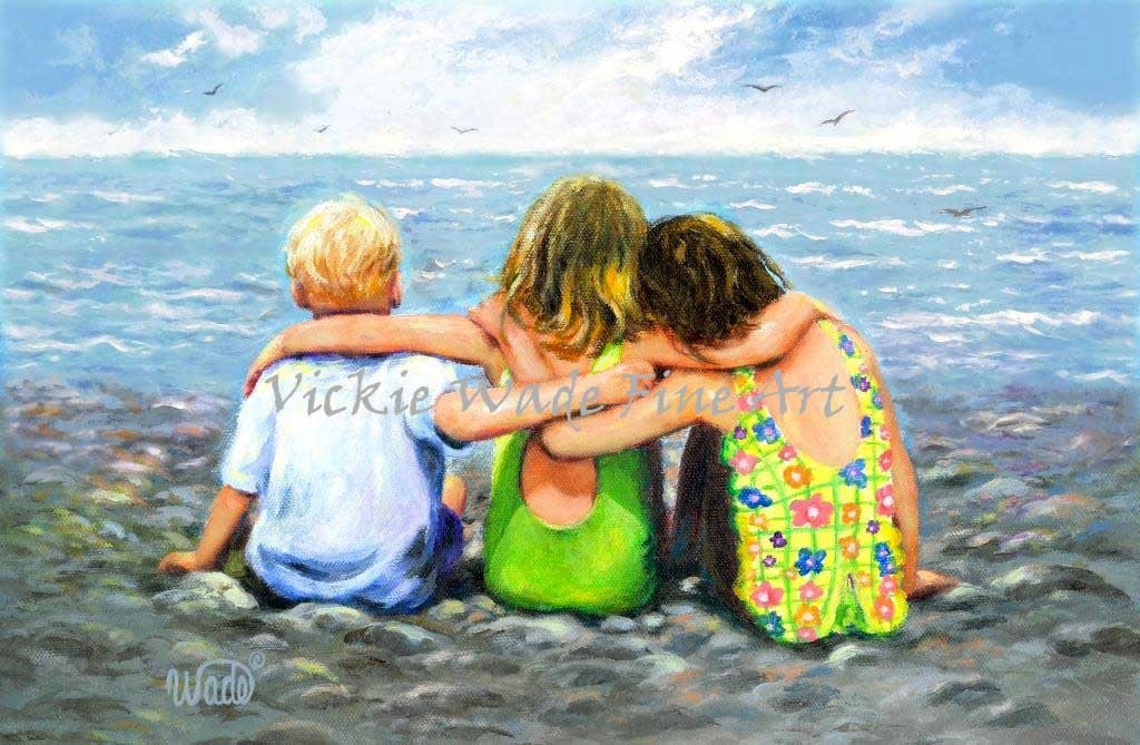 Three Beach Children Hugging on Rocks by the Sparkling Sea Poster