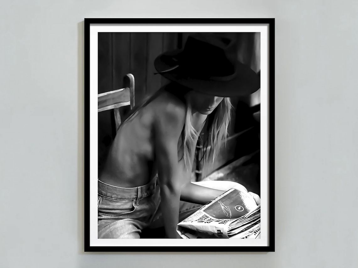 Cowgirl in Hat Reading Newspaper Black and White Western Photo Poster