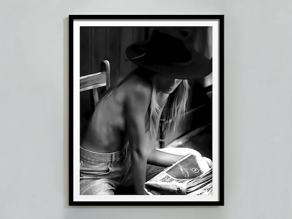 Cowgirl in Hat Reading Newspaper Black and White Western Photo Poster