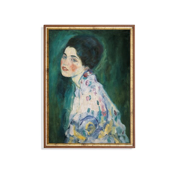 Woman in a Patterned Dress Against a Green Background Portrait Poster