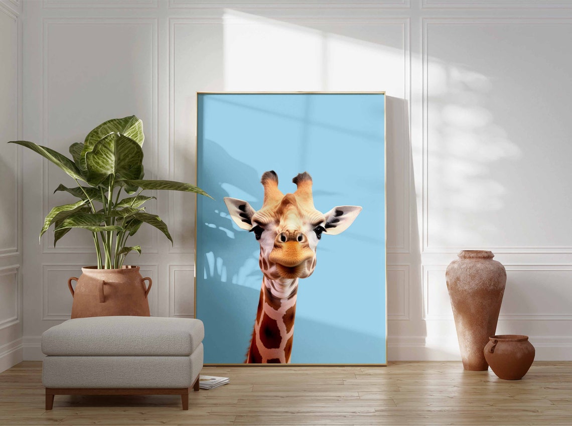 Baby Giraffe Looking Up at Camera on Bright Blue Background Poster - Image 3