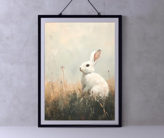 White Rabbit Sitting In A Golden Meadow Under Soft Light Poster