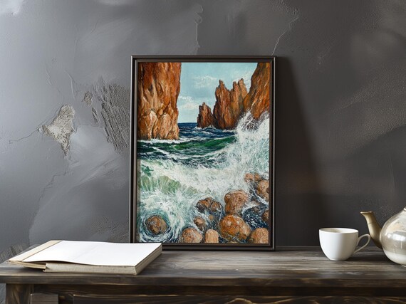 Ocean Wave Exploding Between Red Sea Stacks and Boulders Poster