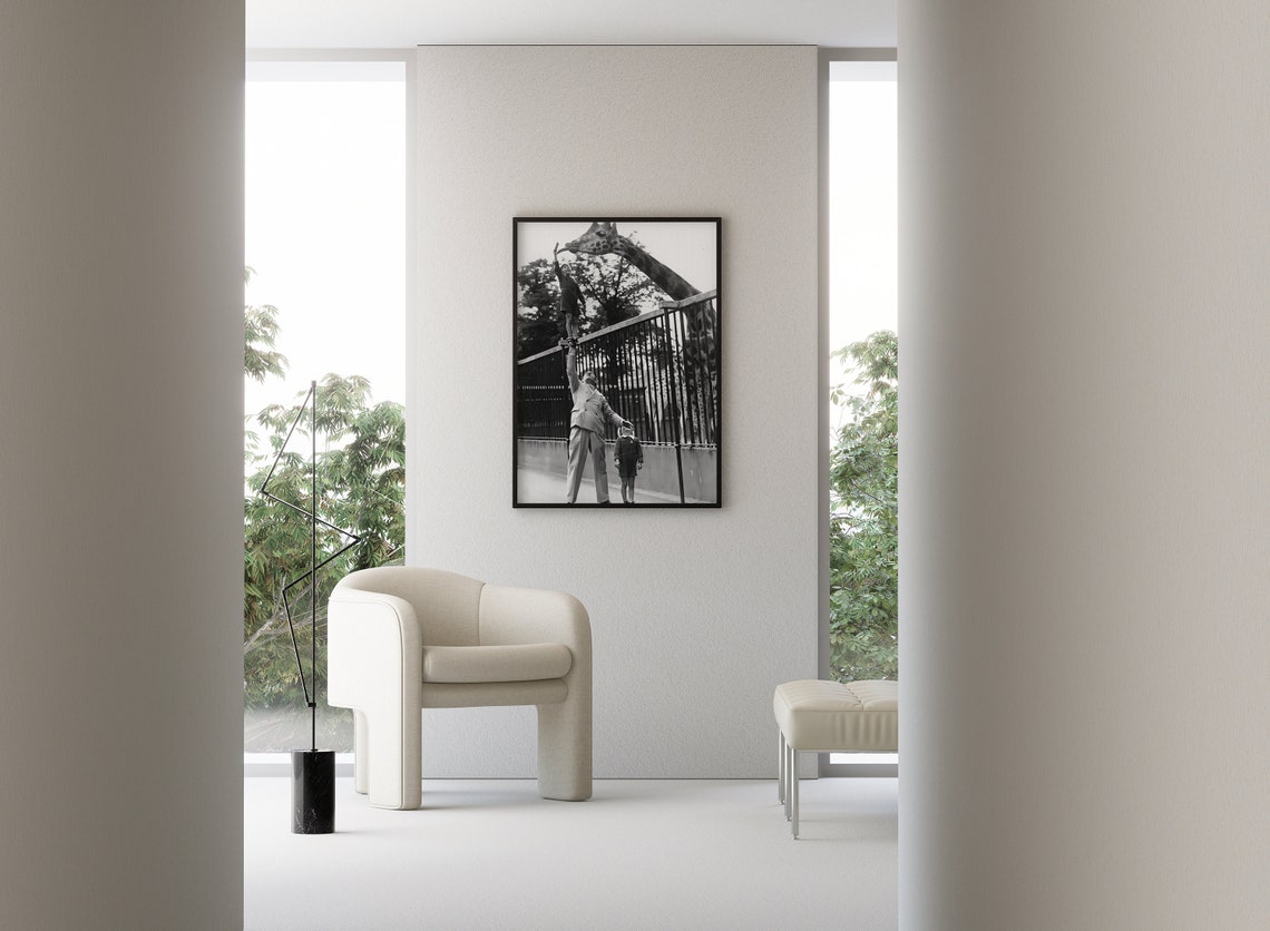 Boy Feeding Giraffe at the Zoo Vintage Black and White Photo Poster - Image 2