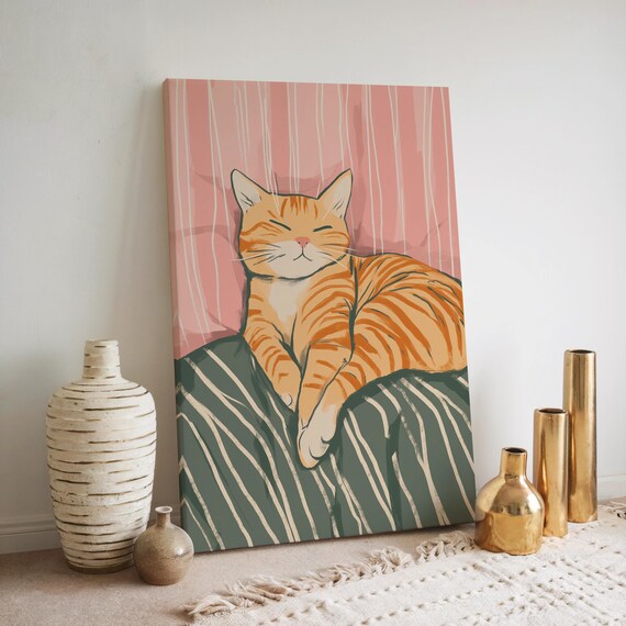 Sleepy Orange Tabby Cat Napping on a Cozy Striped Bed Poster