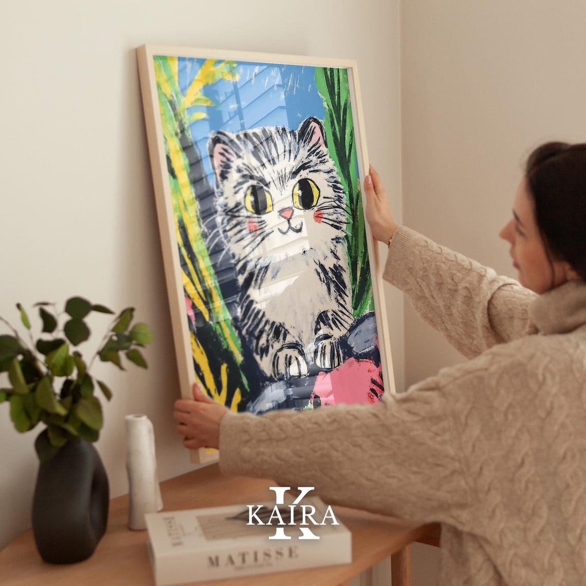 Wide Eyed Fluffy Tabby Kitten Peeking Out of Bright Greenery Poster - Image 5