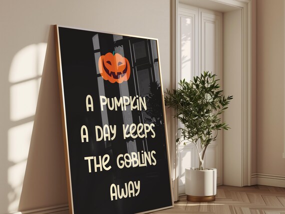 A Pumpkin A Day Keeps The Goblins Away Funny Jack O Lantern Quote Poster
