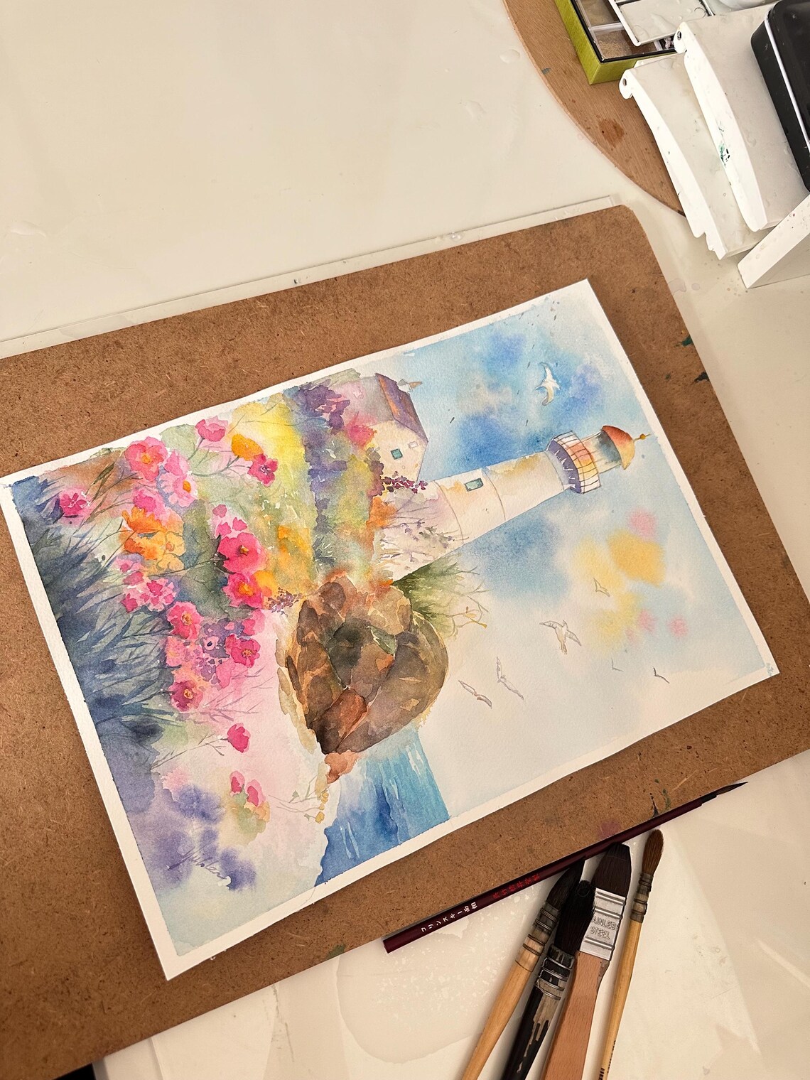 White Lighthouse on a Rocky Wildflower Coast Watercolor Poster - Image 3