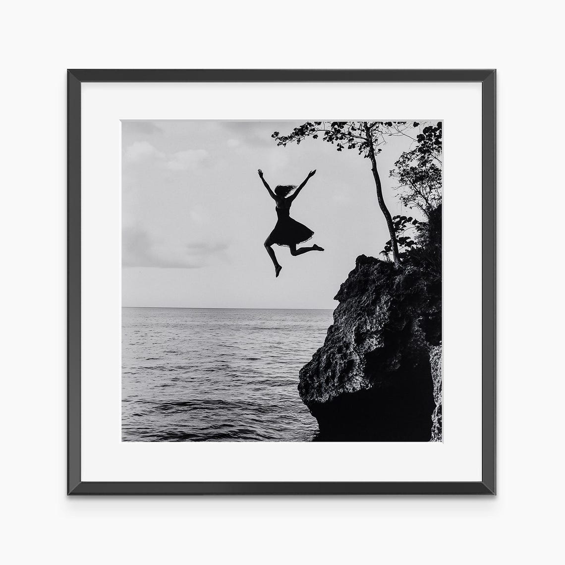 Woman Leaping From Cliff Into The Sea Black And White Photo Poster