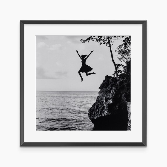 Woman Leaping From Cliff Into The Sea Black And White Photo Poster