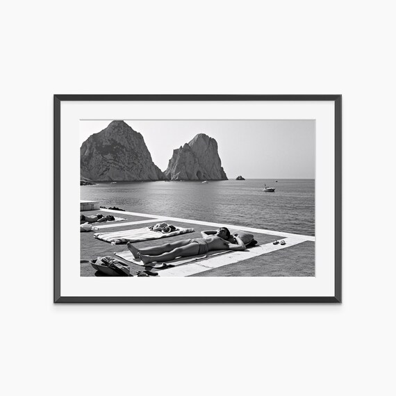 Vintage Sunbather on Rocky Seacoast Black and White Photo Poster