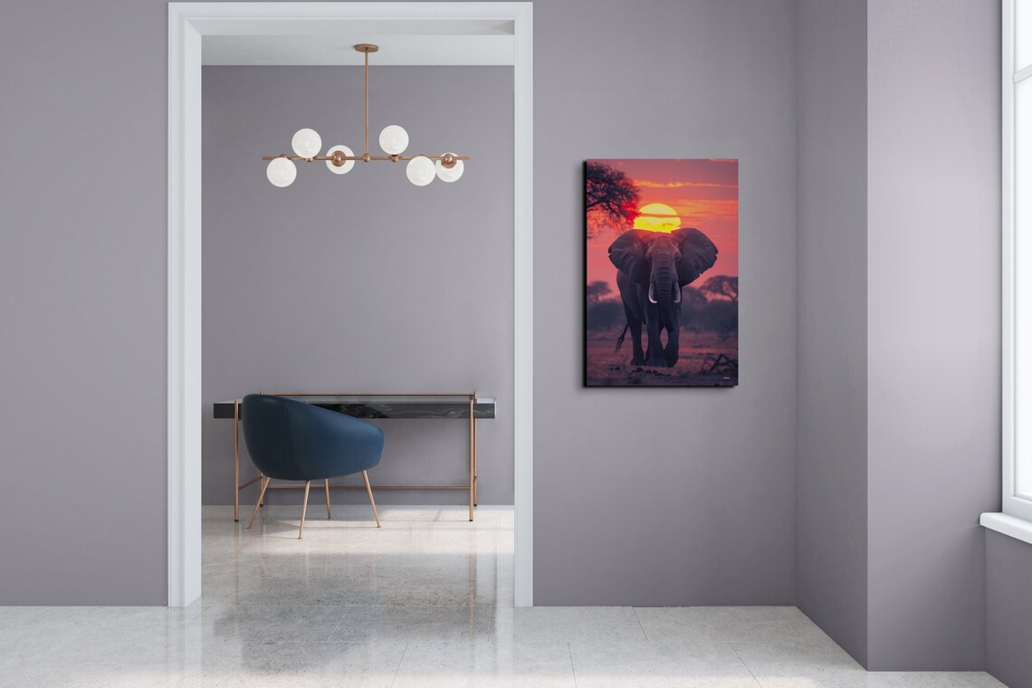 Majestic African Elephant Walking Toward a Red Sunset Poster - Image 5