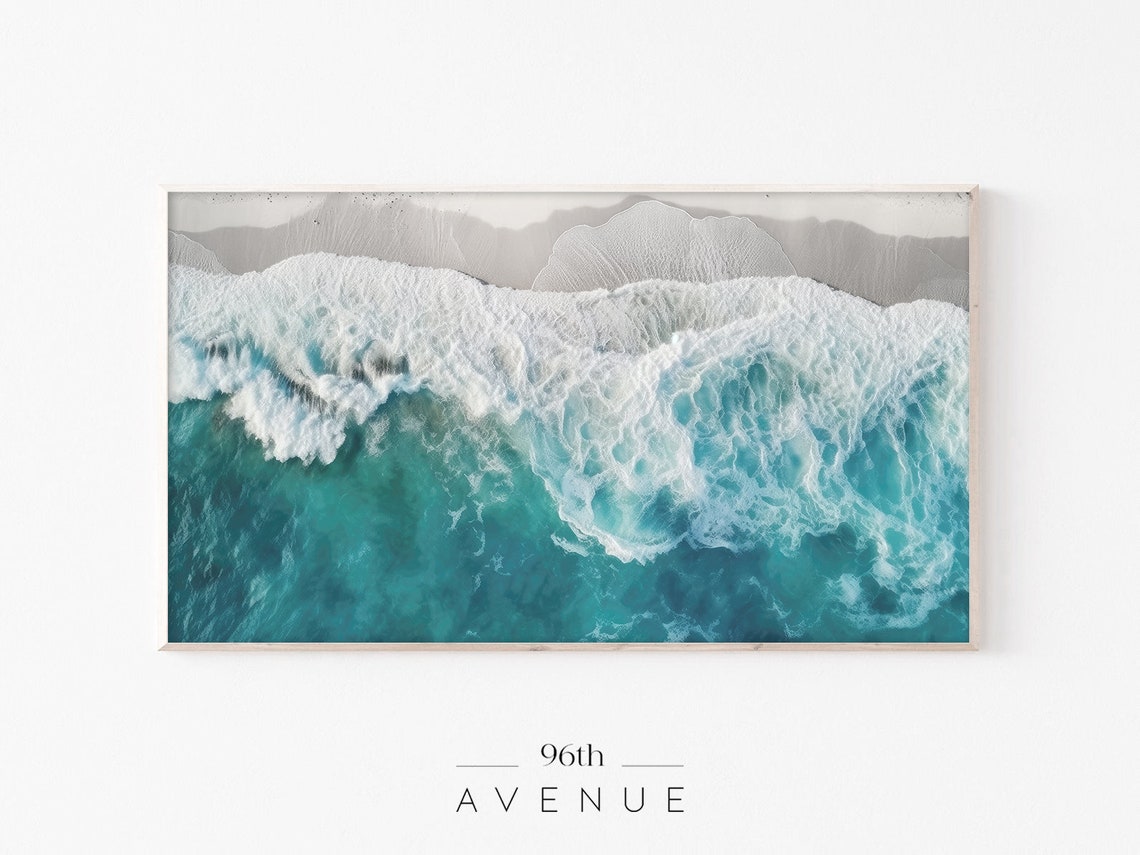 Aerial Turquoise Waves With White Foam Over Shallow Coast Poster