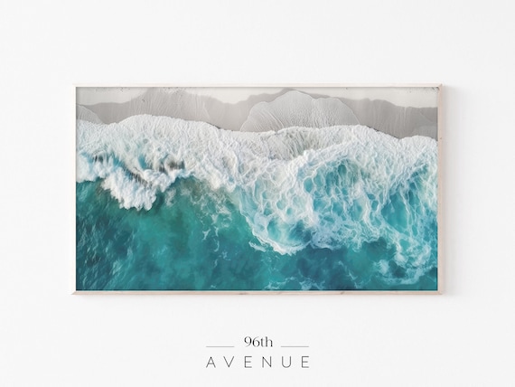 Aerial Turquoise Waves With White Foam Over Shallow Coast Poster