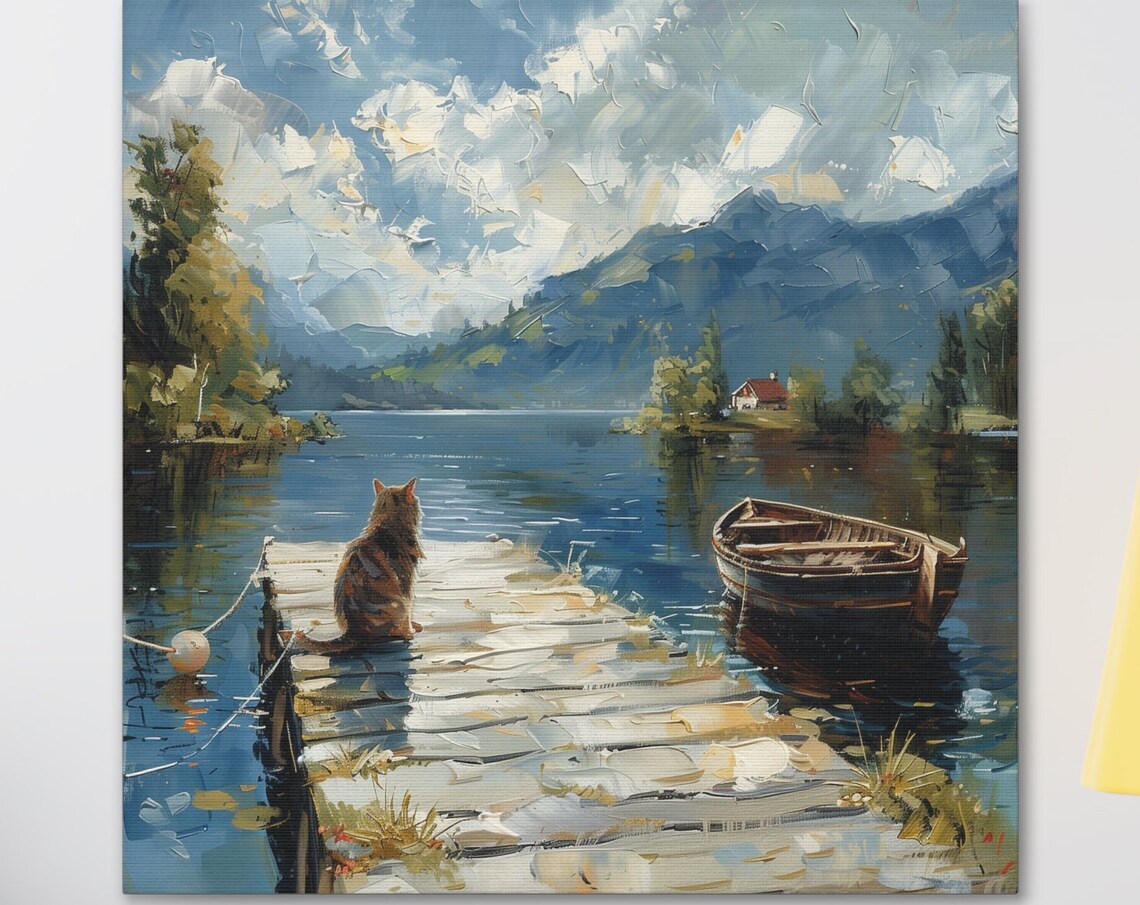 Tabby Cat Sitting on a Dock by a Mountain Lake with Rowboat Poster