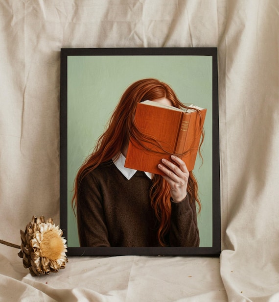 Red Haired Woman Reading An Orange Book On Sage Green Bookworm Poster