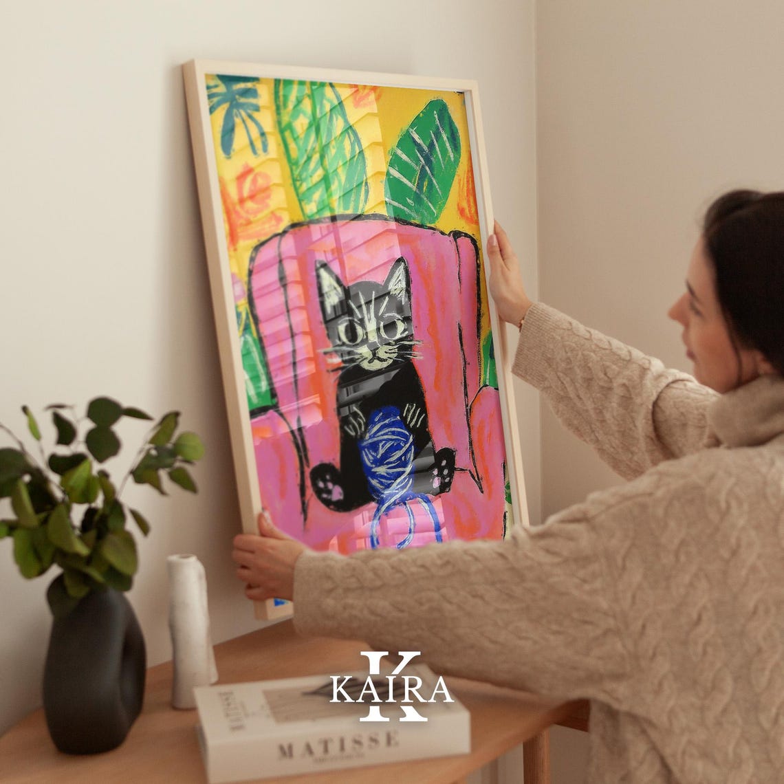 Black Kitten Playing With a Yarn Ball on a Pink Chair Poster - Image 2