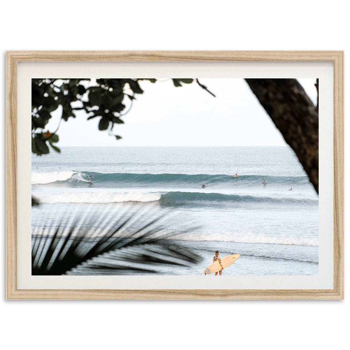 Surfers Riding Ocean Swell Framed By Tropical Palm Trees Poster