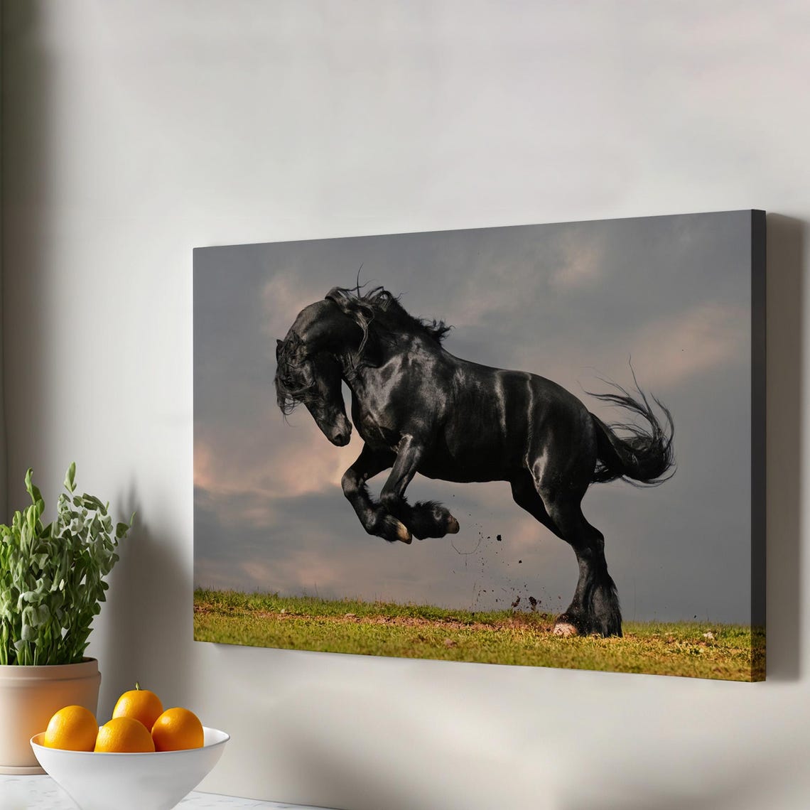 Black Horse Rearing On Green Field Beneath Stormy Sky Photo Print