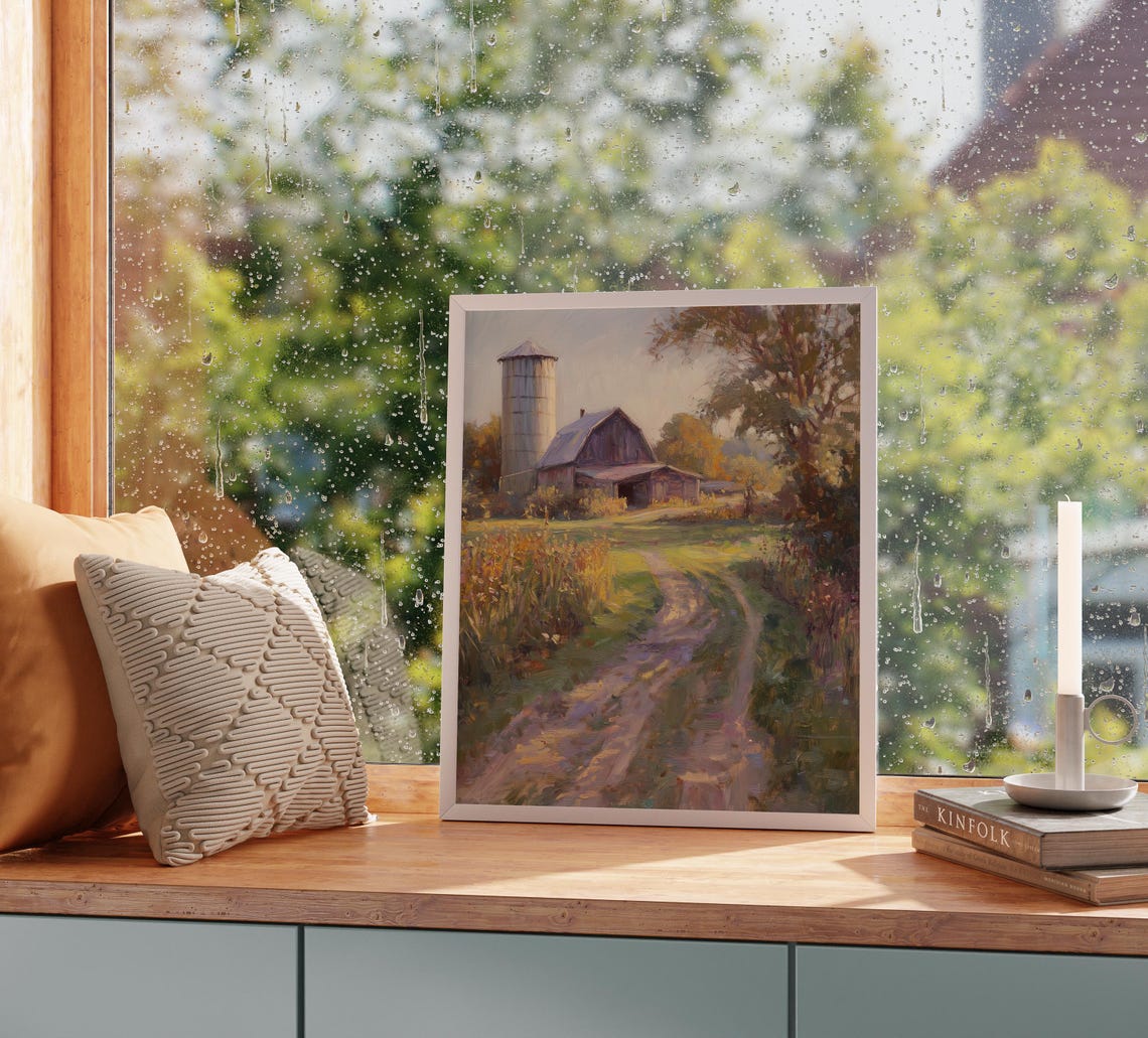 Old Red Barn With a Tall Silo Beside a Sunlit Country Road Poster - Image 2